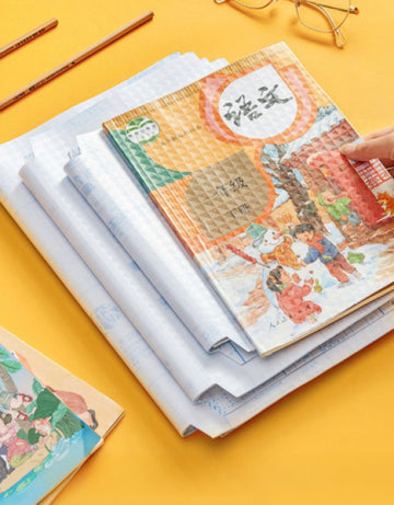 Self-adhesive transparent protective book cover